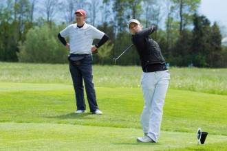 Me and my caddy (aka dad) teeing it up in Switzerland